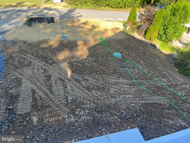 a view of a backyard of a house