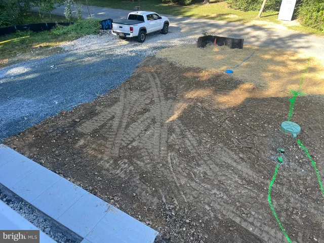 a view of kitchen with wooden floor