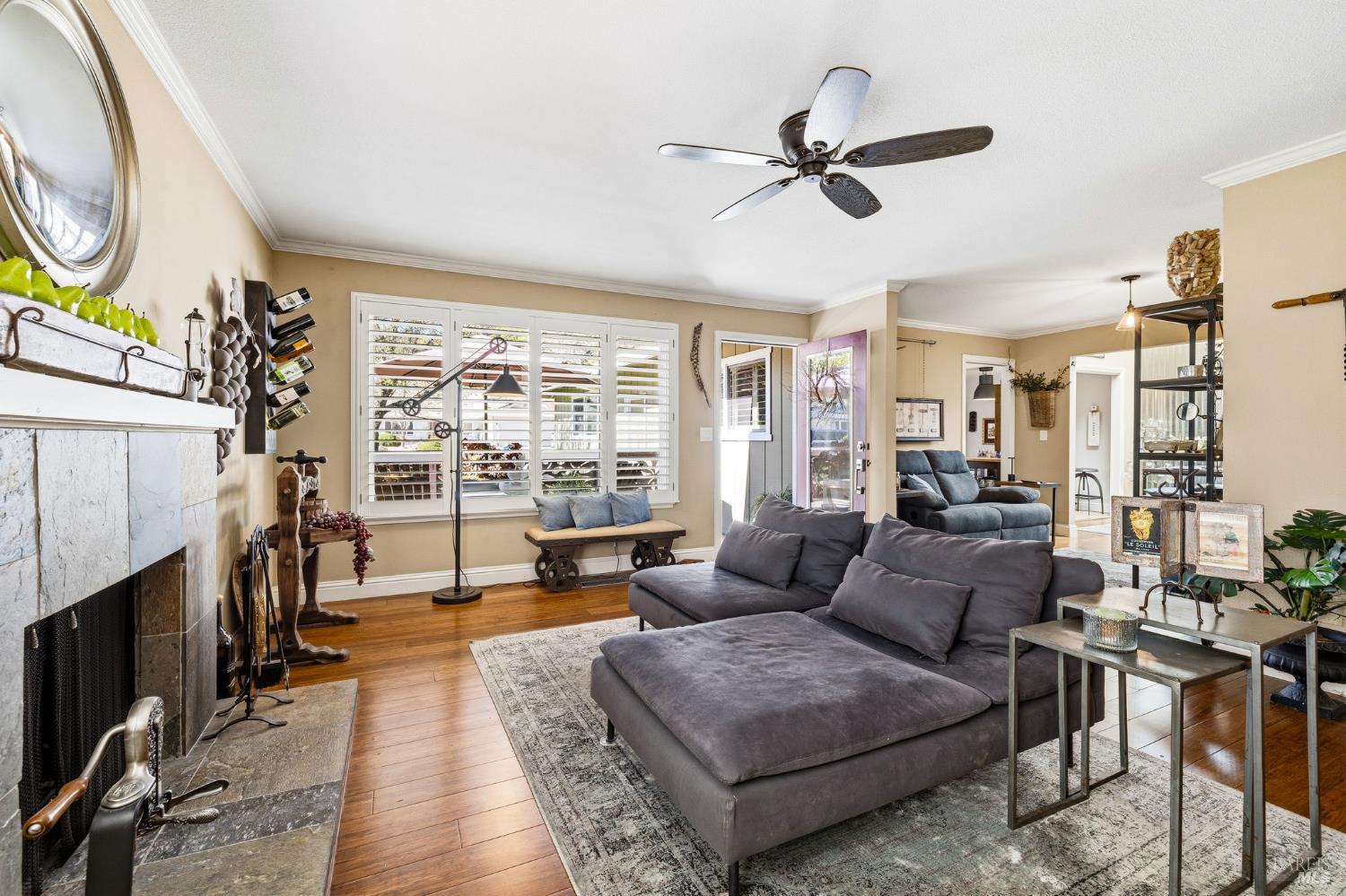 7409 Oakmont Drive Santa Rosa, CA 95409 - Photo 11 of 44 a living room with furniture a fireplace and a large window