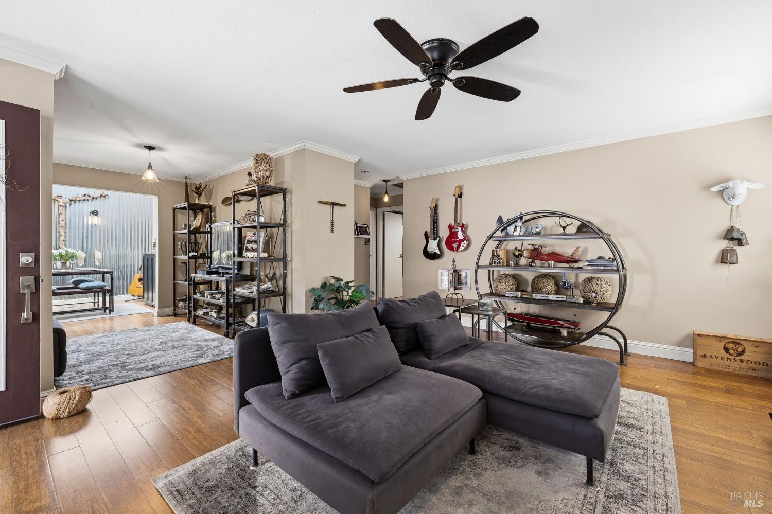 7409 Oakmont Drive Santa Rosa, CA 95409 - Photo 12 of 44 a living room with furniture a rug and a chandelier