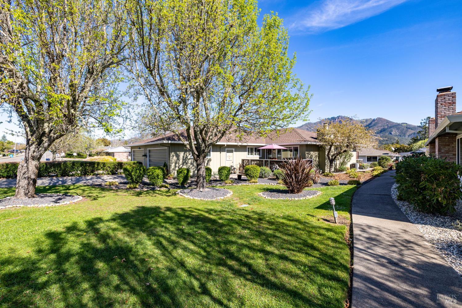 7409 Oakmont Drive Santa Rosa, CA 95409 - Photo 3 of 44 a view of yard with swimming pool and green space