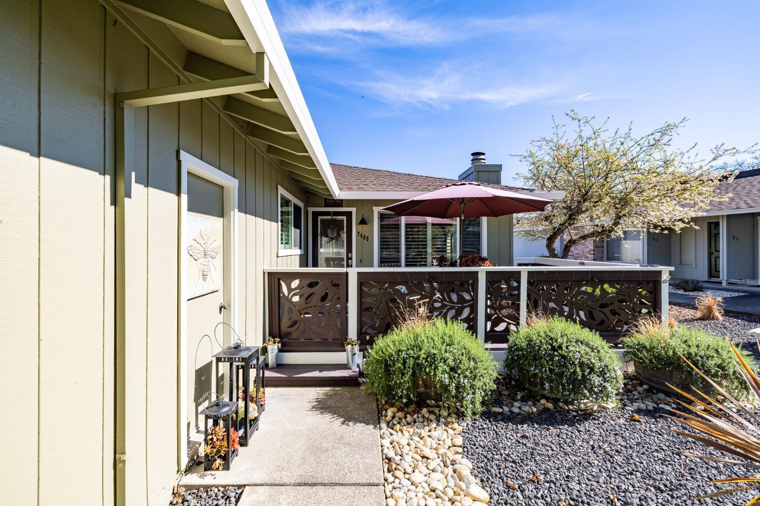 7409 Oakmont Drive Santa Rosa, CA 95409 - Photo 6 of 44 a view of a garden with a patio