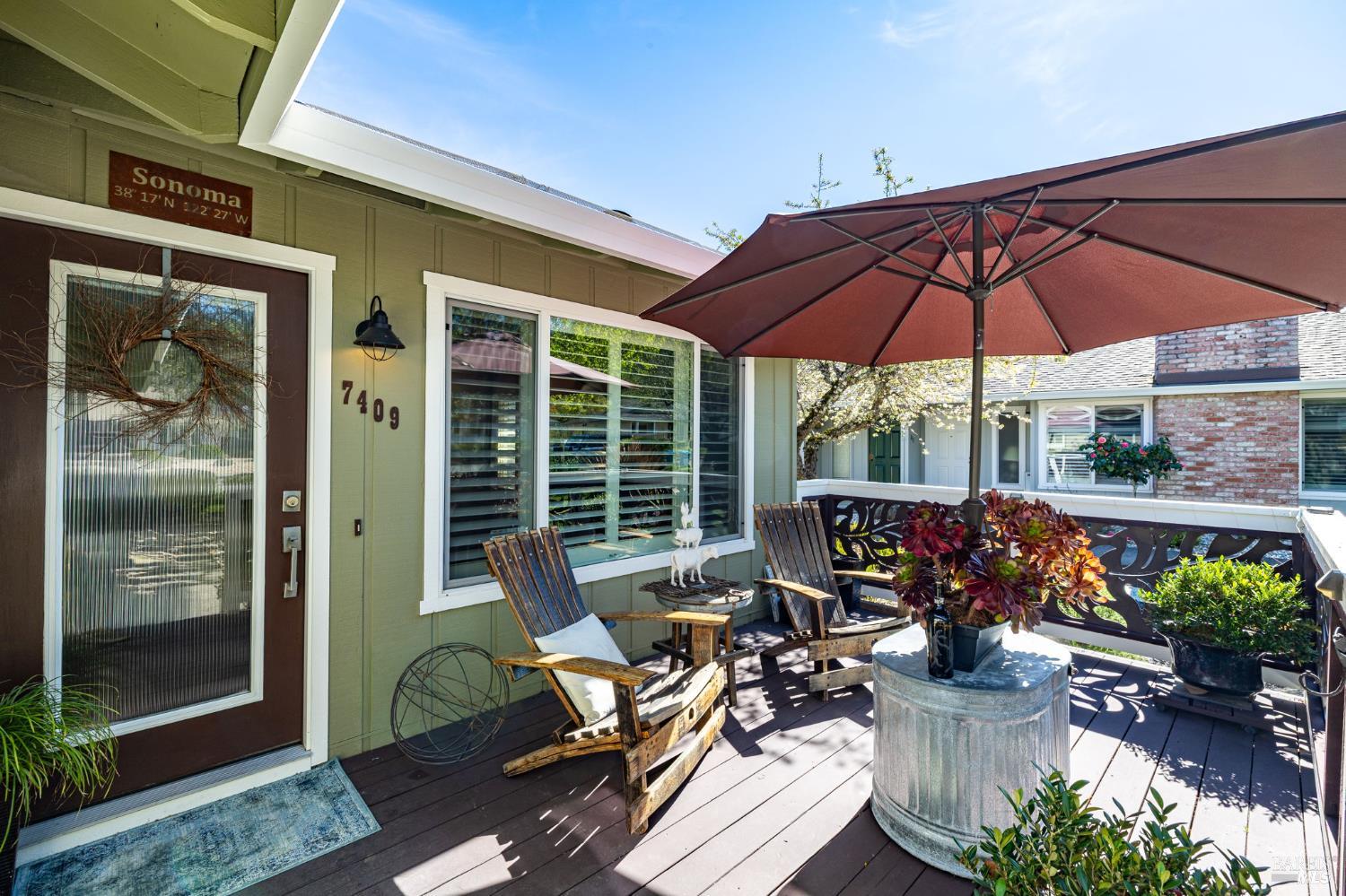 7409 Oakmont Drive Santa Rosa, CA 95409 - Photo 7 of 44 a view of a patio with chairs and potted plants