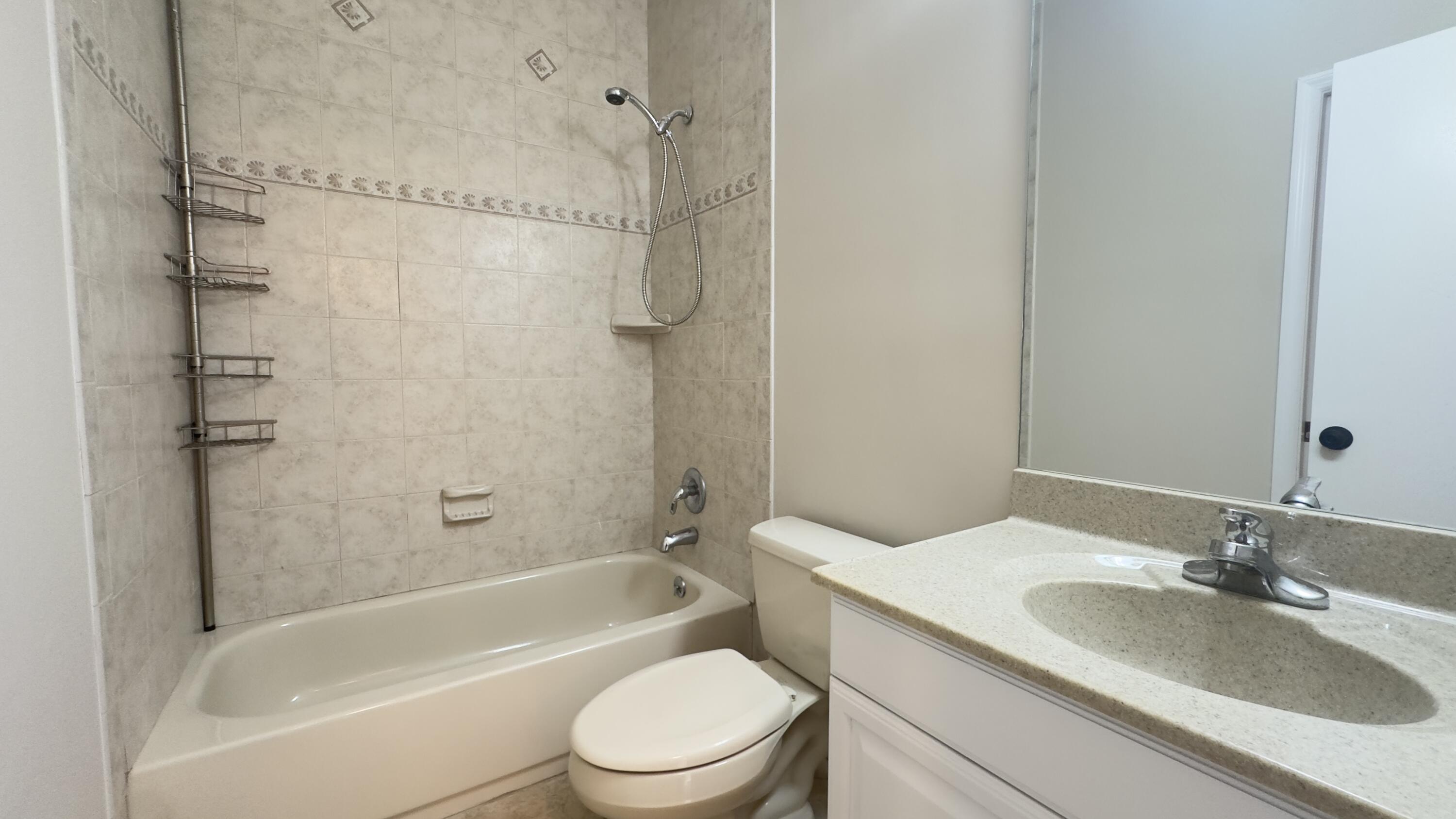 11330 Timber Lodge Terrace Boca Raton, FL 33428 - Photo 10 of 23 a bathroom with a sink toilet and shower