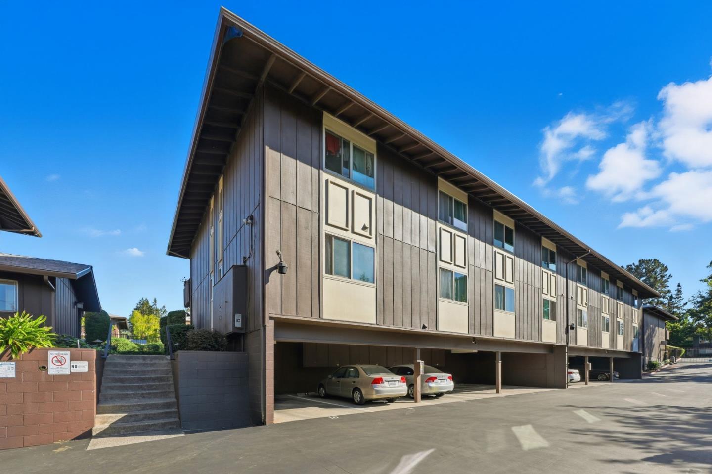 100 East Middlefield Road, Unit 6G Mountain View, CA 94043 - Photo 24 of 34 a front view of a building with street