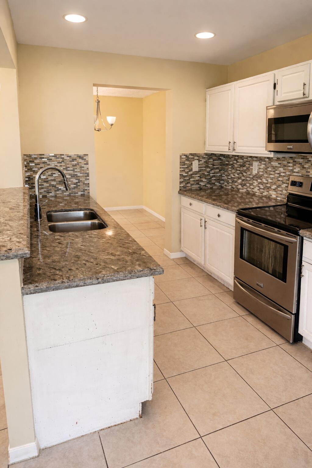 Bright kitchen with granite counters