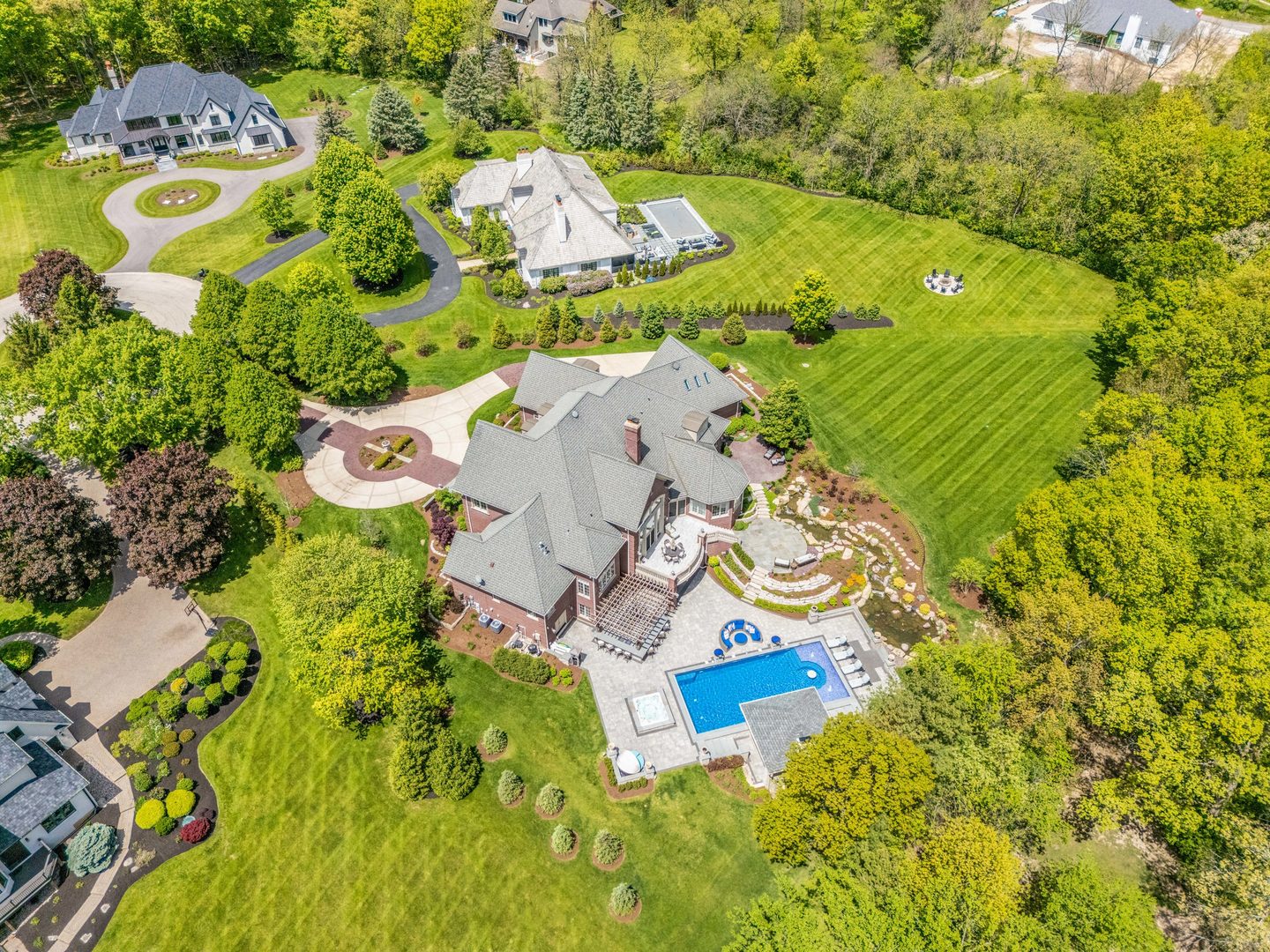 4N881 Old Farm Road St. Charles, IL 60175 - Photo 61 of 66 an aerial view of residential house with swimming pool and yard