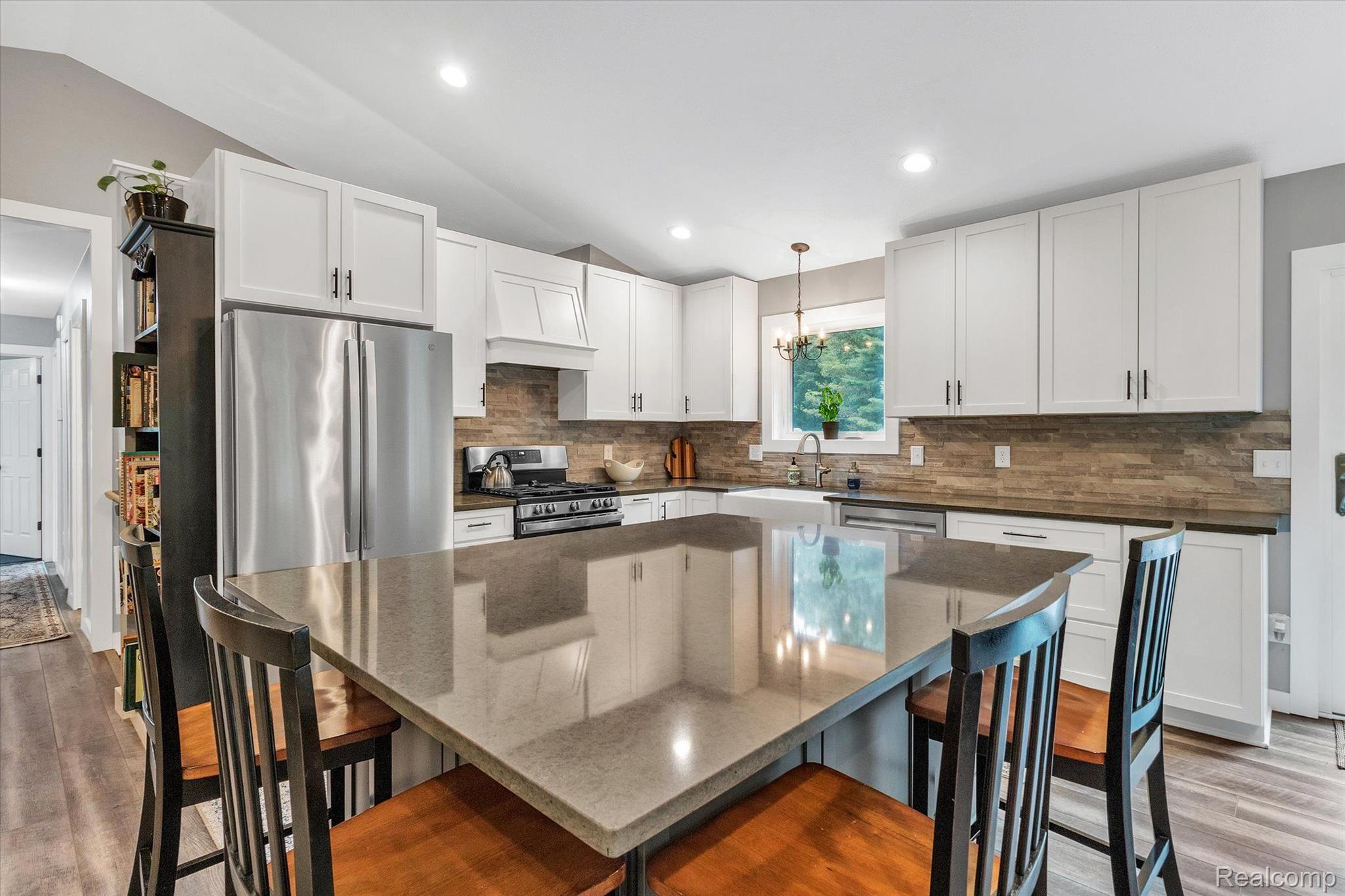 1744 Peavy Road Howell, MI 48843 - Photo 9 of 34 Quartz counters, 5' x 6.5' painted island