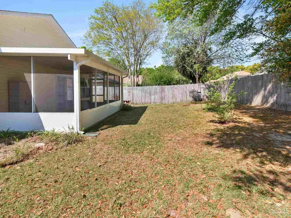 a view of back yard of the house