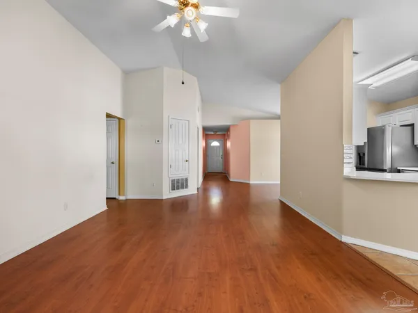 a view of a livingroom with wooden floor