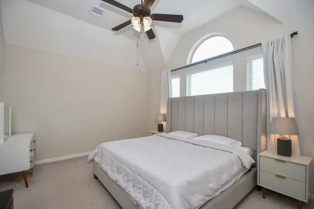 a bathroom with a double vanity sink mirror and double