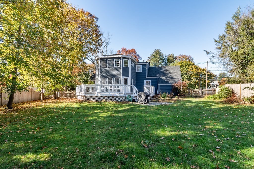 399 Edgell Road Framingham, MA 01701 - Photo 2 of 24 a view of a house with a backyard