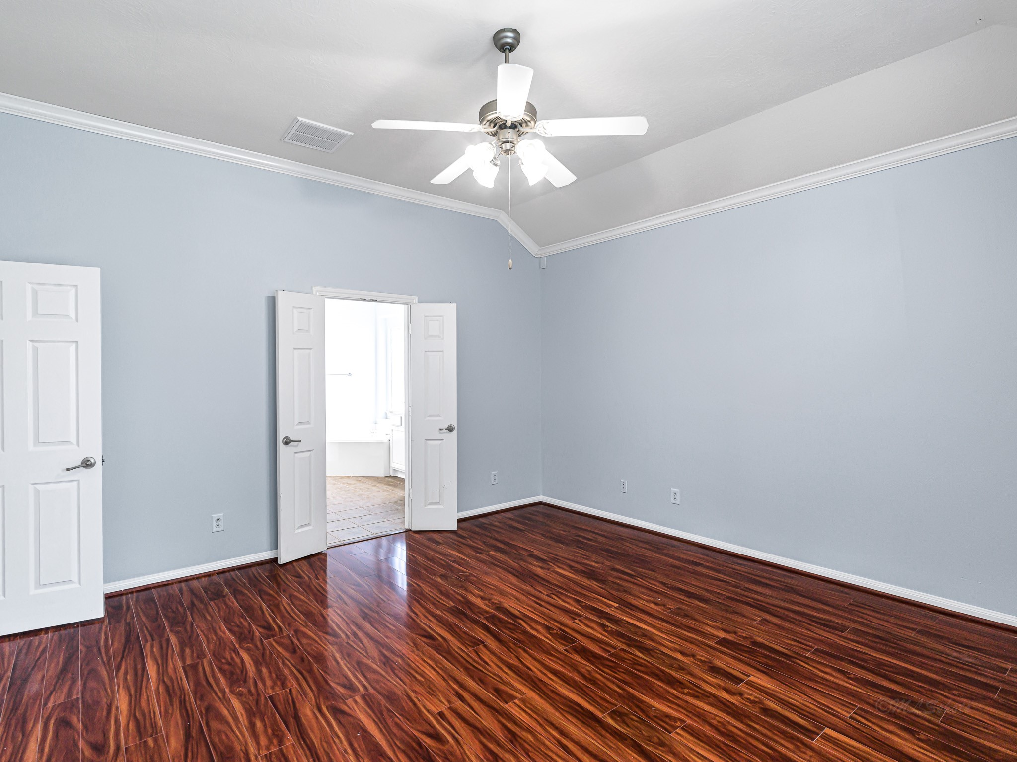 25203 Auburn Terrace Drive Spring, TX 77389 - Photo 13 of 21 a big room with wooden floor chandelier fan and windows