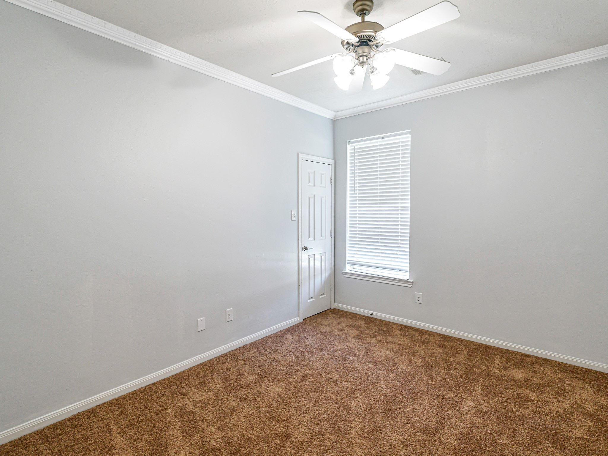 25203 Auburn Terrace Drive Spring, TX 77389 - Photo 17 of 21 a view of an empty room with a window