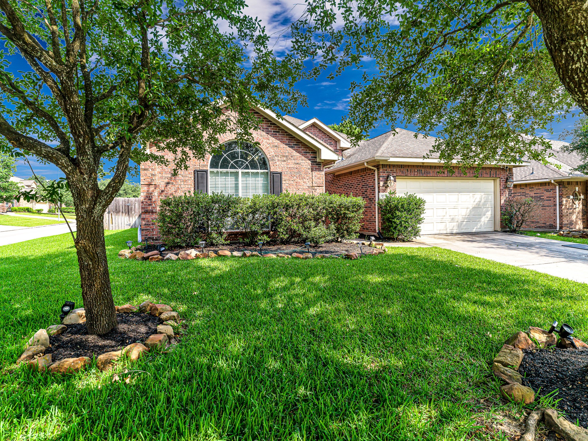 25203 Auburn Terrace Drive Spring, TX 77389 - Photo 2 of 21 a front view of a house with garden