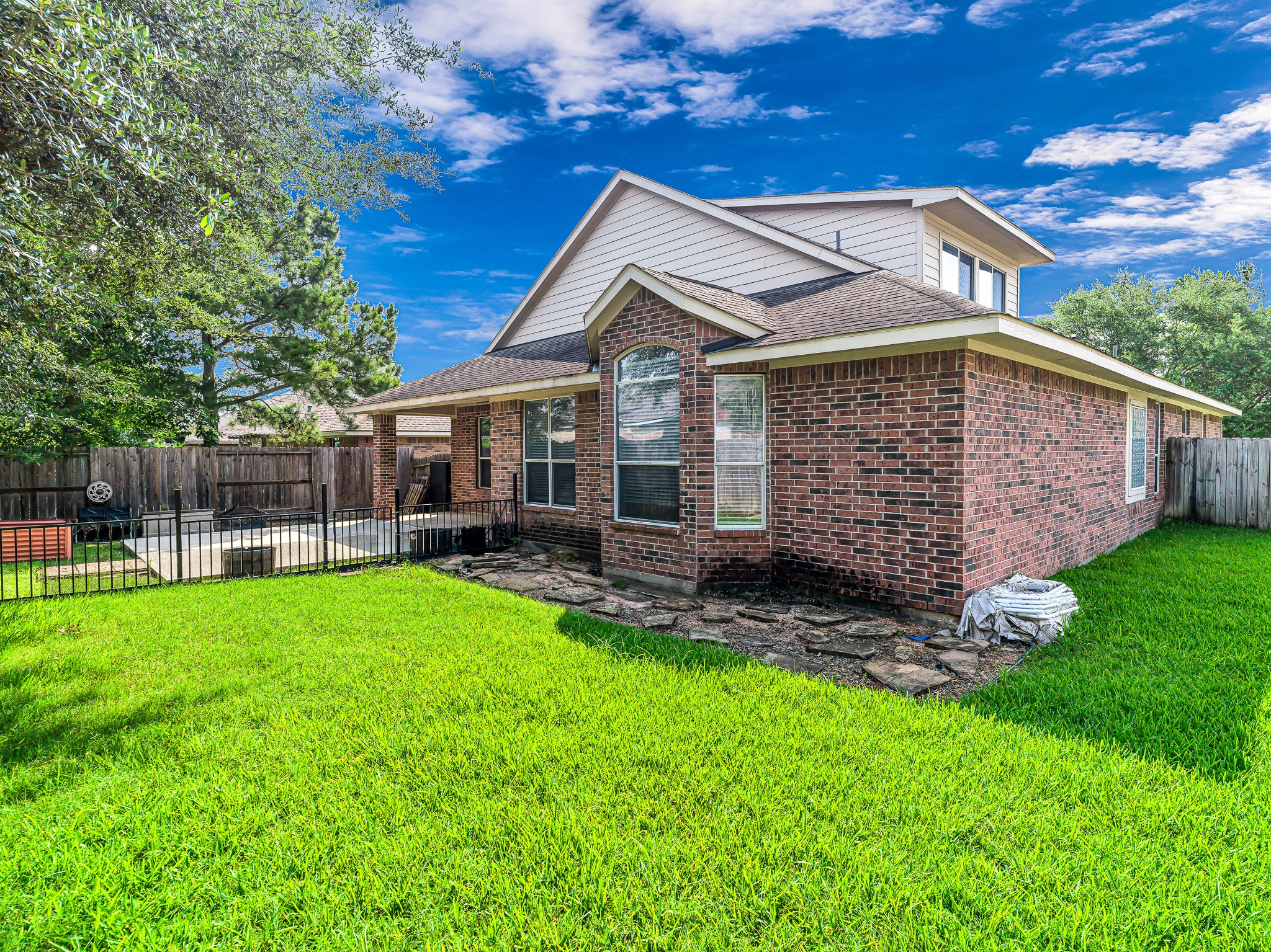 25203 Auburn Terrace Drive Spring, TX 77389 - Photo 3 of 21 a front view of a house with garden