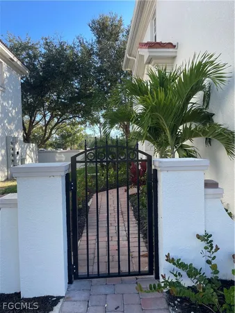 a flower plants in front of a house