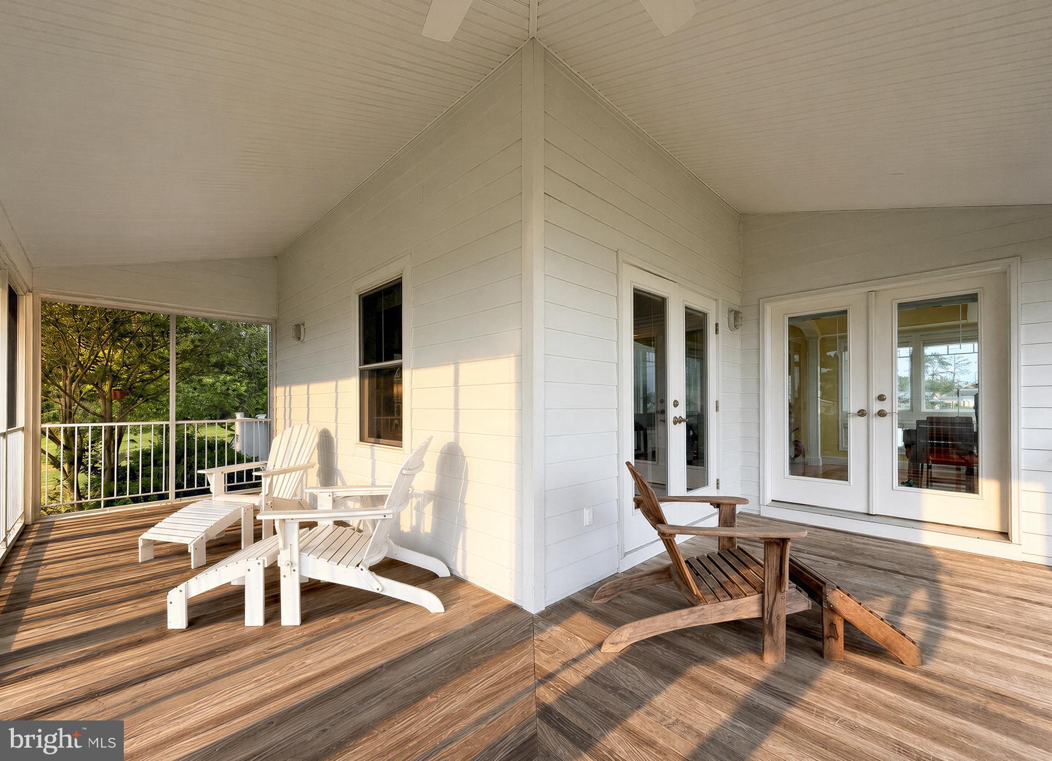 16144 Thomas Road Piney Point, MD 20674 - Photo 34 of 98 Tranquil Wrap-Around Screened Porch with Ipe Deck