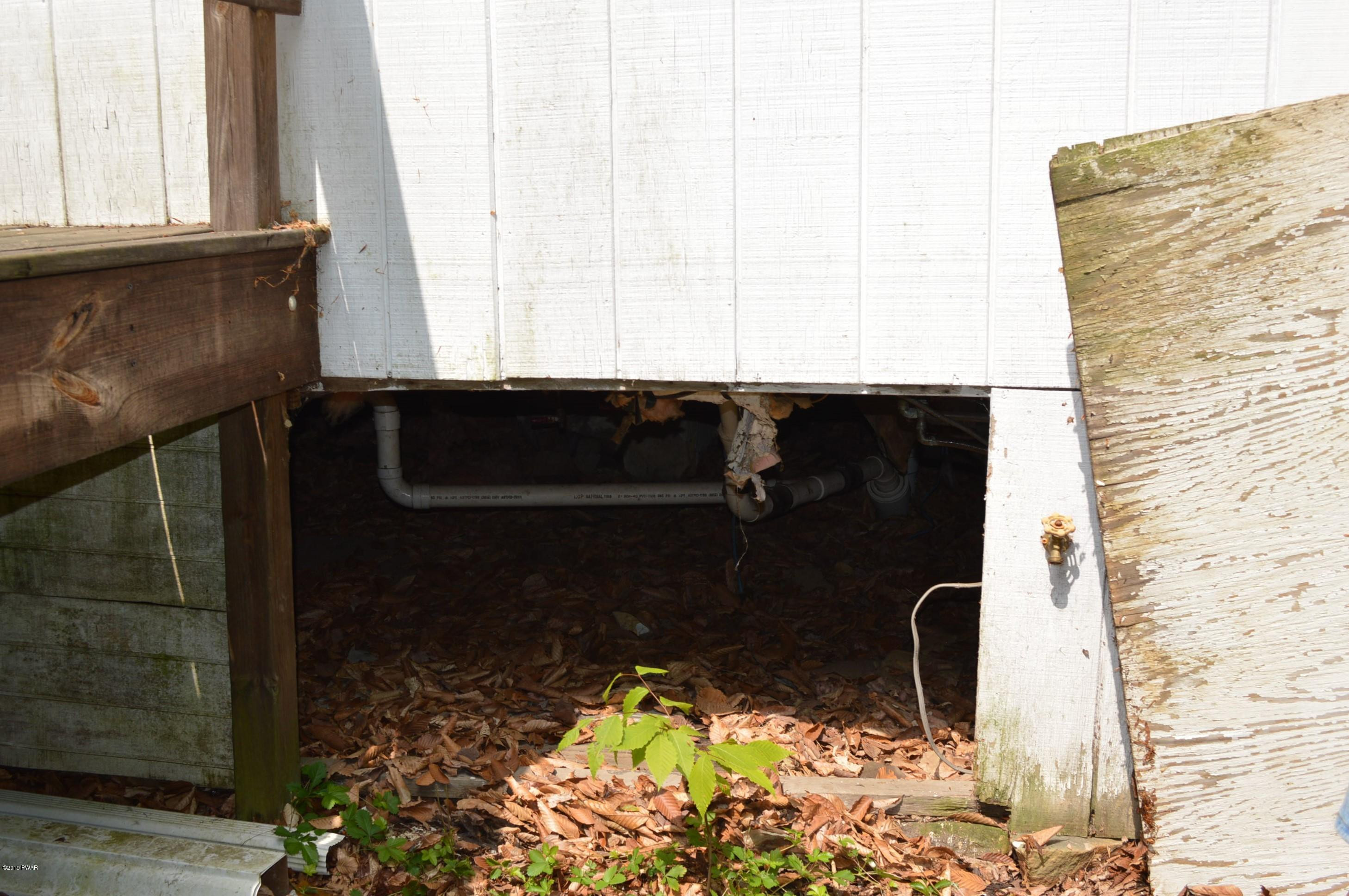250 South Turnpike Road Newfoundland, PA 18445 - Photo 24 of 26 Entrance to crawlspace