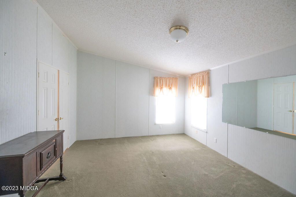 5933 Moseley Dixon Road Macon, GA 31220 - Photo 12 of 38 a view of an empty room with a window