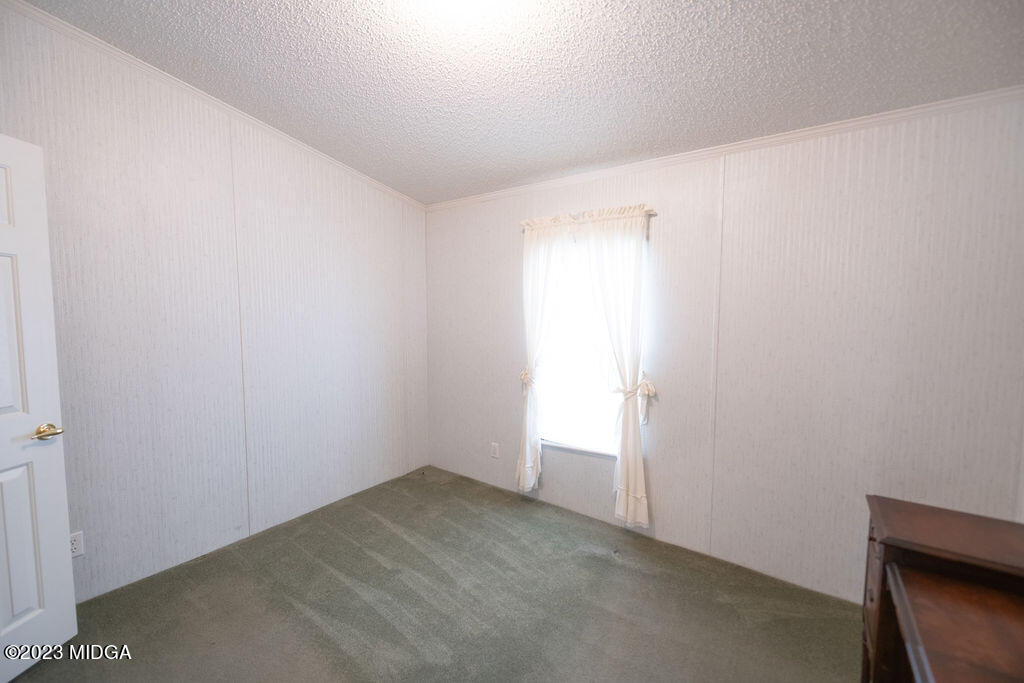 5933 Moseley Dixon Road Macon, GA 31220 - Photo 19 of 38 a view of an empty room