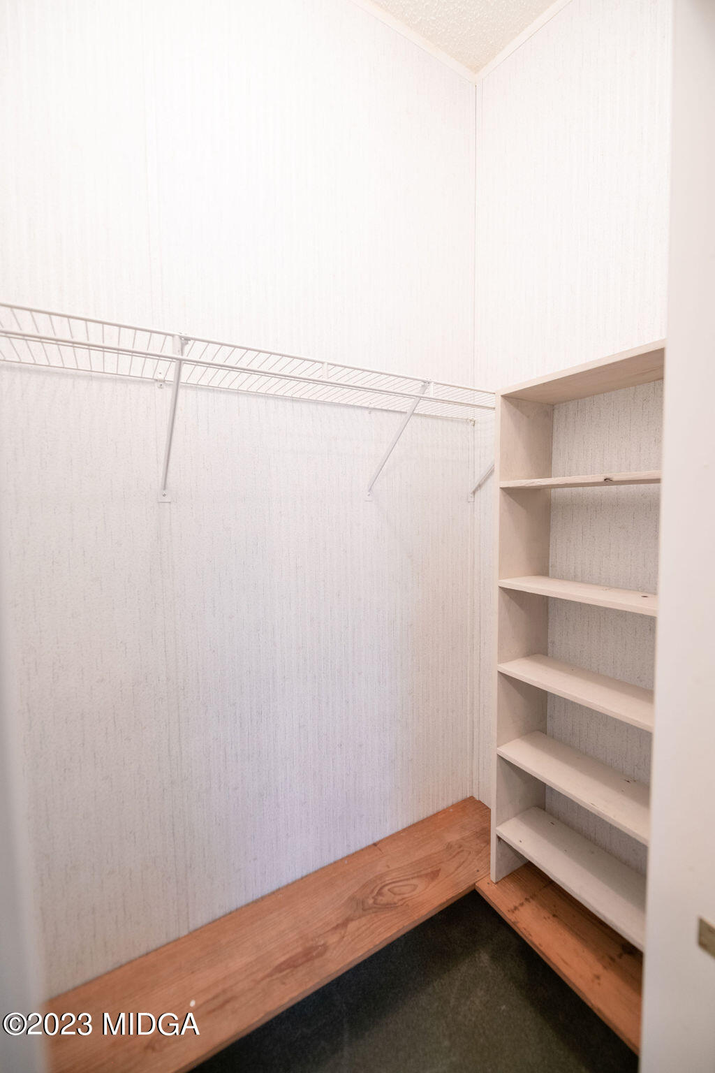 5933 Moseley Dixon Road Macon, GA 31220 - Photo 20 of 38 a view of an empty walk in closet