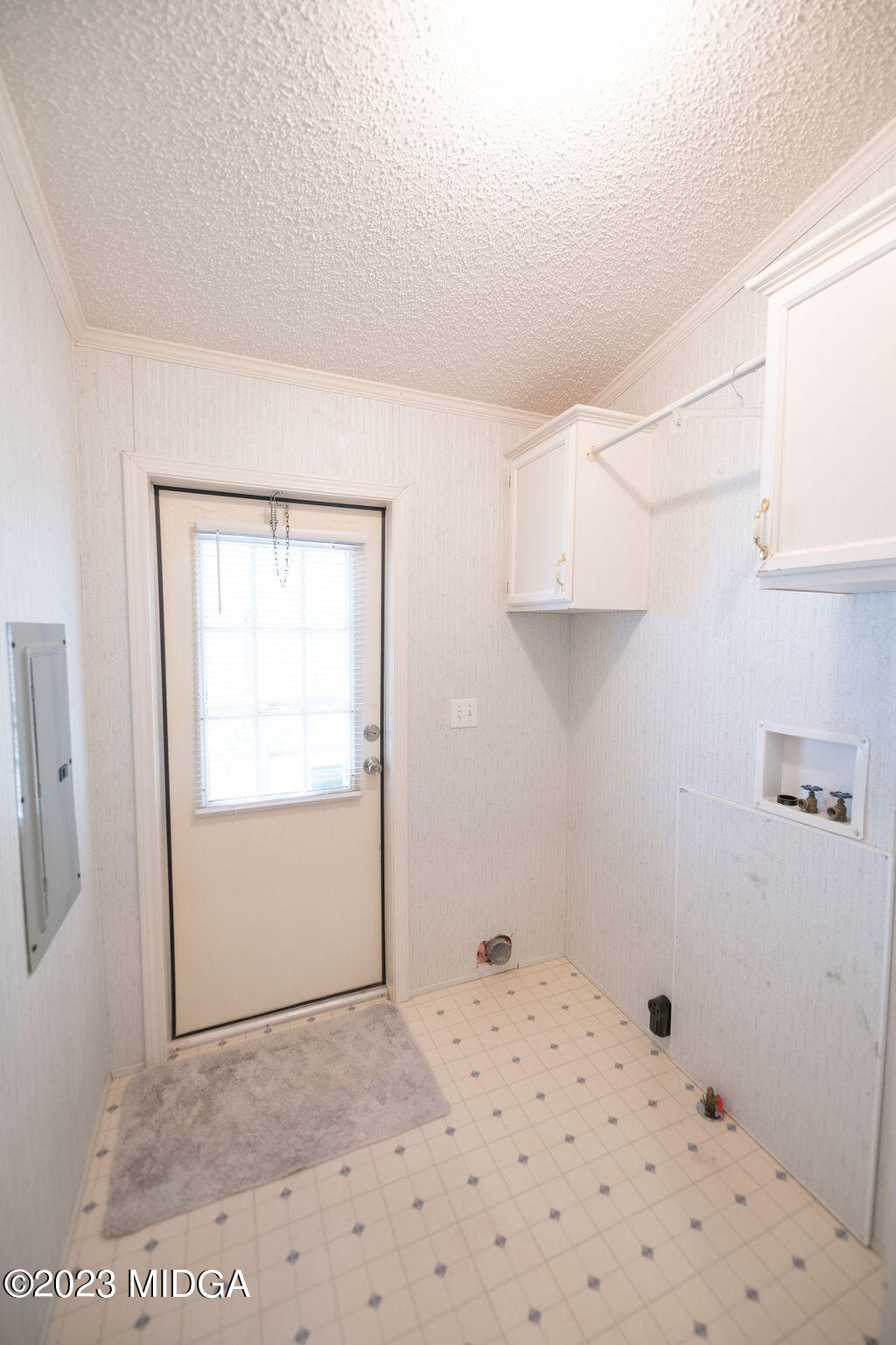 5933 Moseley Dixon Road Macon, GA 31220 - Photo 22 of 38 a bathroom with a window and a shower