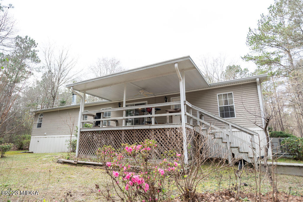 5933 Moseley Dixon Road Macon, GA 31220 - Photo 25 of 38 a view of a house with a yard