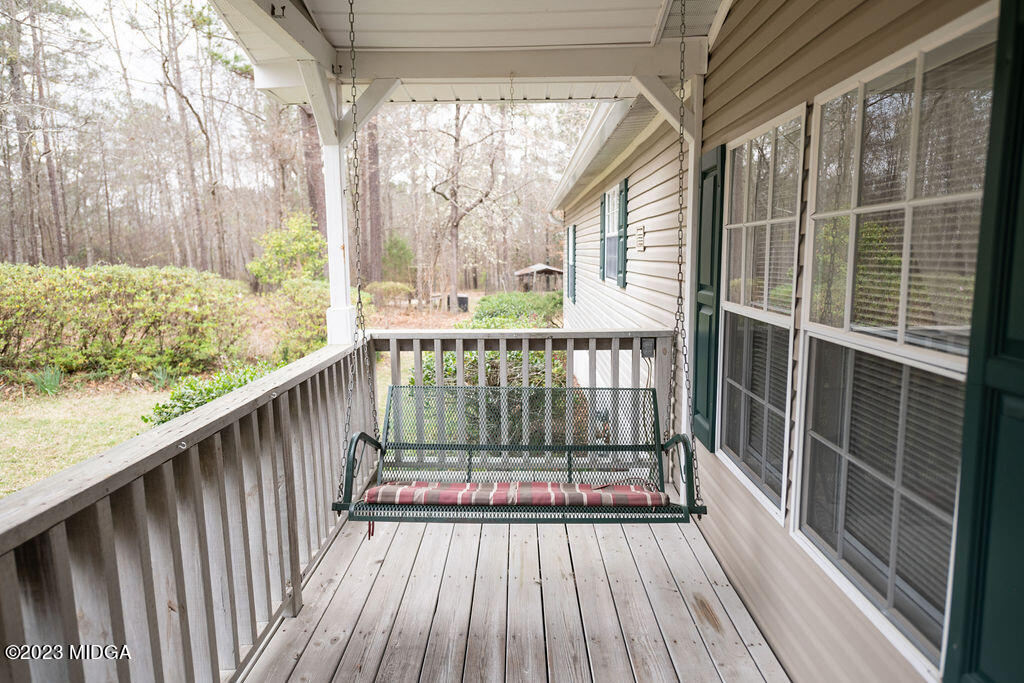 5933 Moseley Dixon Road Macon, GA 31220 - Photo 5 of 38 a view of balcony with wooden floor