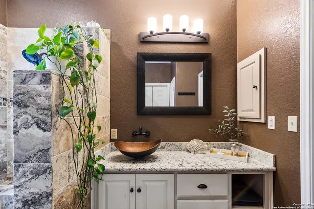 a bedroom with furniture and windows