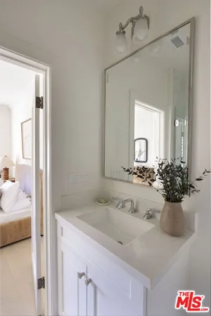 a utility room with a white curtain