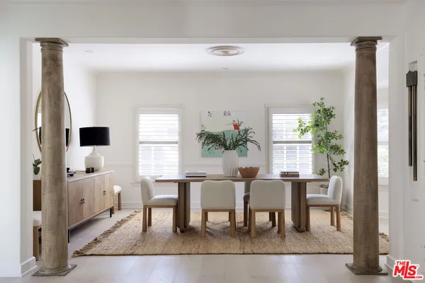 a view of a livingroom with furniture and window