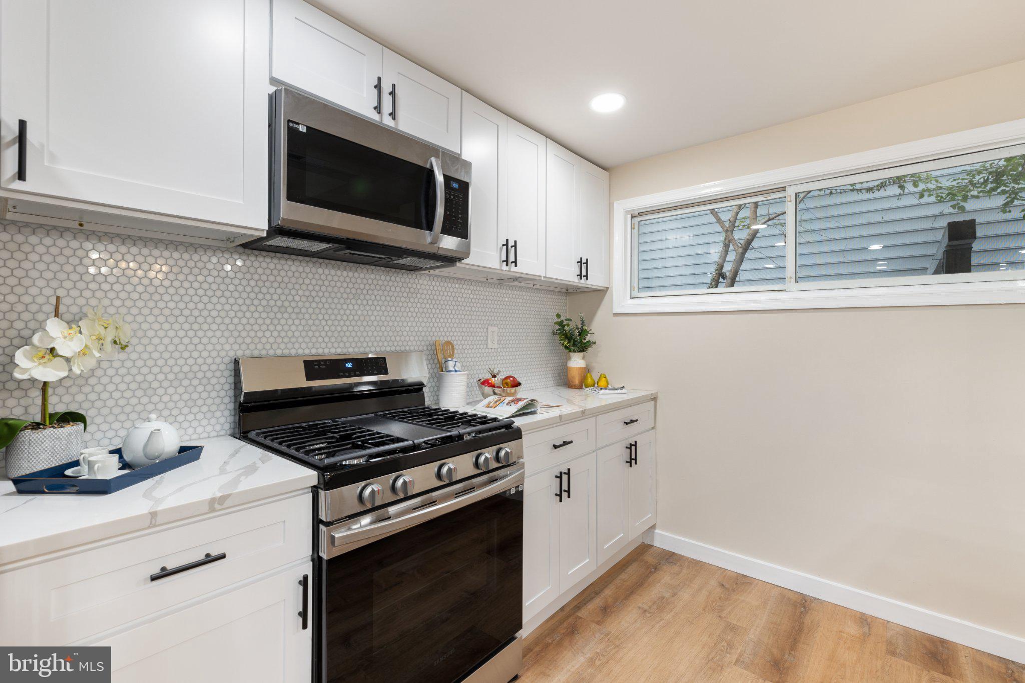 3215 Edgewood Road Kensington, MD 20895 - Photo 16 of 37 Modern kitchen with sleek finishes.