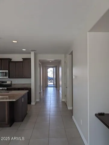 a view of a kitchen with a sink and dishwasher