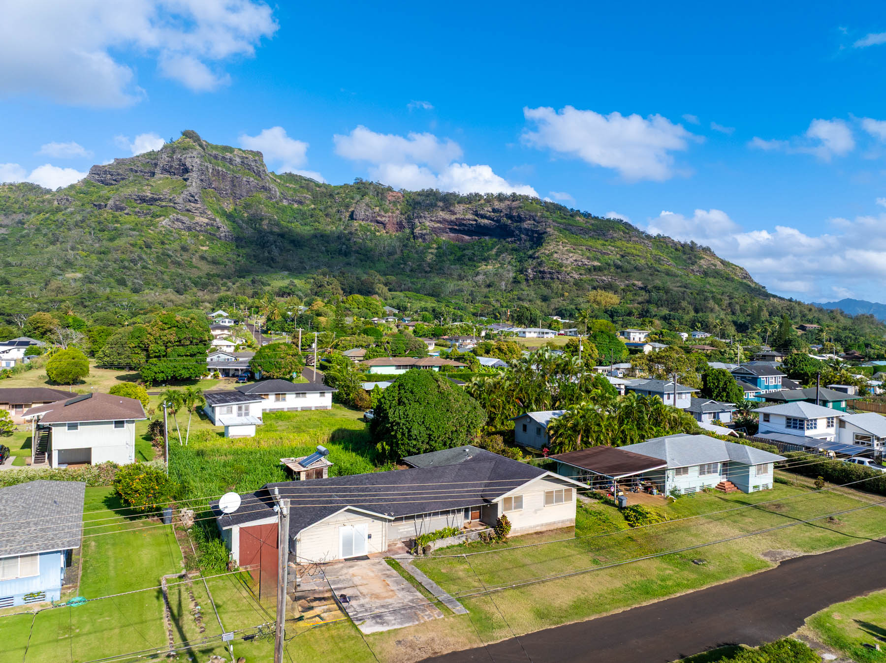 267 Hookipa Road Kapaa, HI 96746 - Photo 14 of 23 a view of a swimming pool with a garden