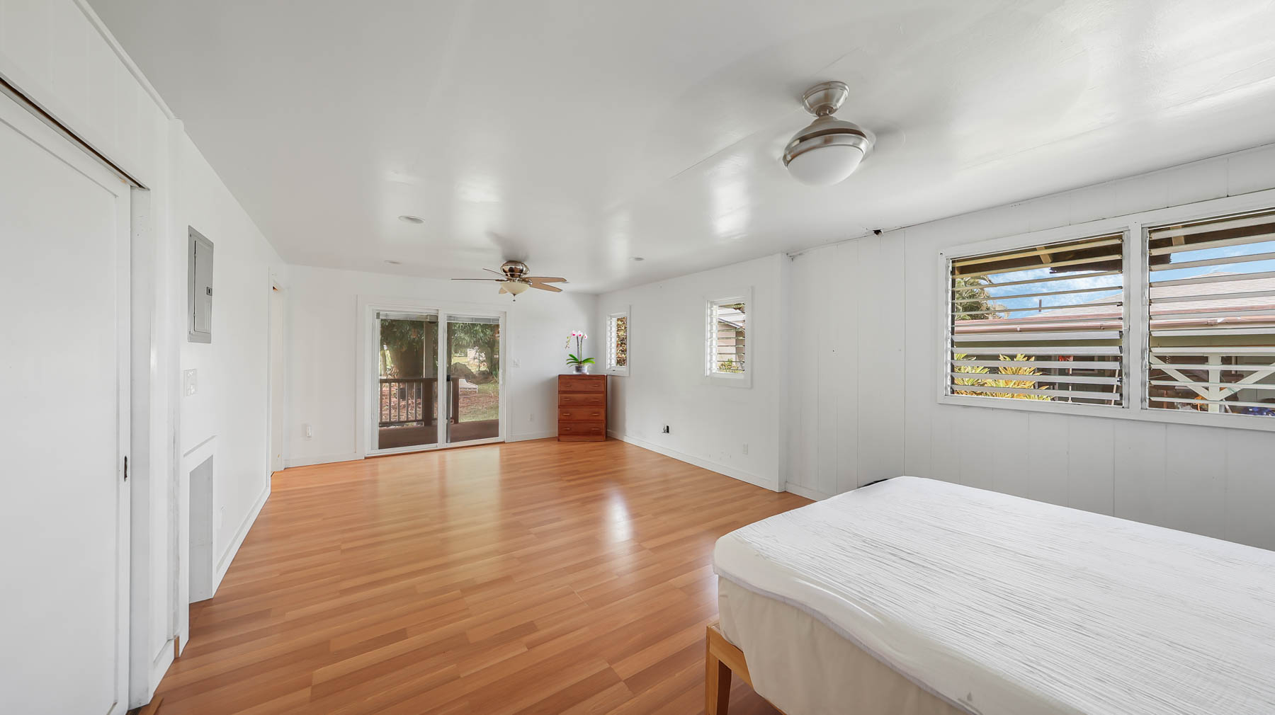 267 Hookipa Road Kapaa, HI 96746 - Photo 10 of 23 a view of an empty room with a window and wooden floor