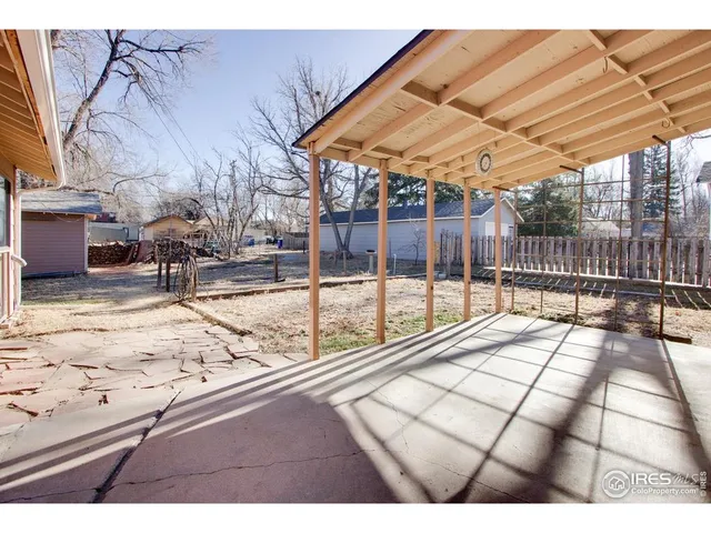 a view of a backyard of the house