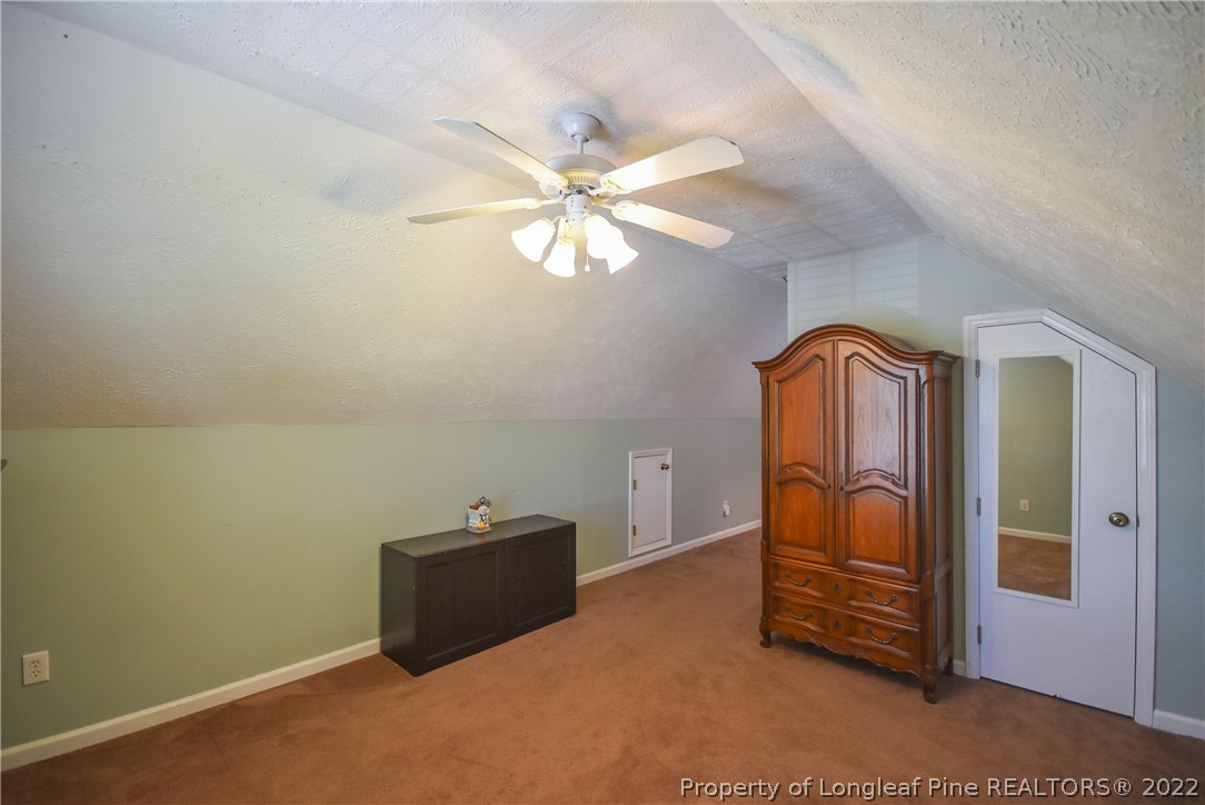 102 Chesapeake Road Cameron, NC 28326 - Photo 34 of 50 an empty room with windows and fan