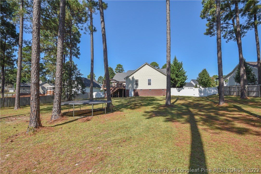 102 Chesapeake Road Cameron, NC 28326 - Photo 49 of 50 a view of a house with backyard and tree