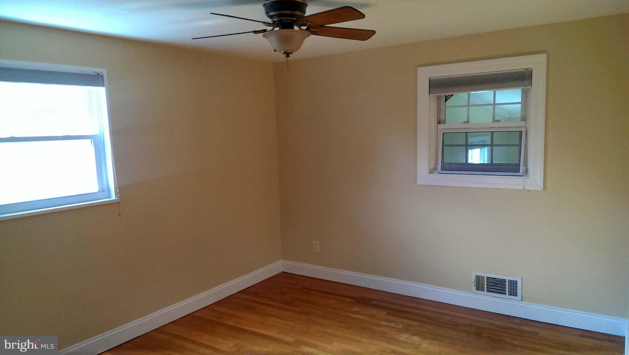 12102 Foley Street Silver Spring, MD 20902 - Photo 13 of 29 an empty room with a window