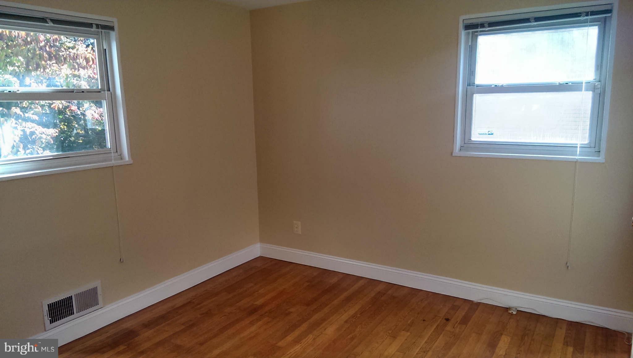 12102 Foley Street Silver Spring, MD 20902 - Photo 18 of 29 an empty room with a window