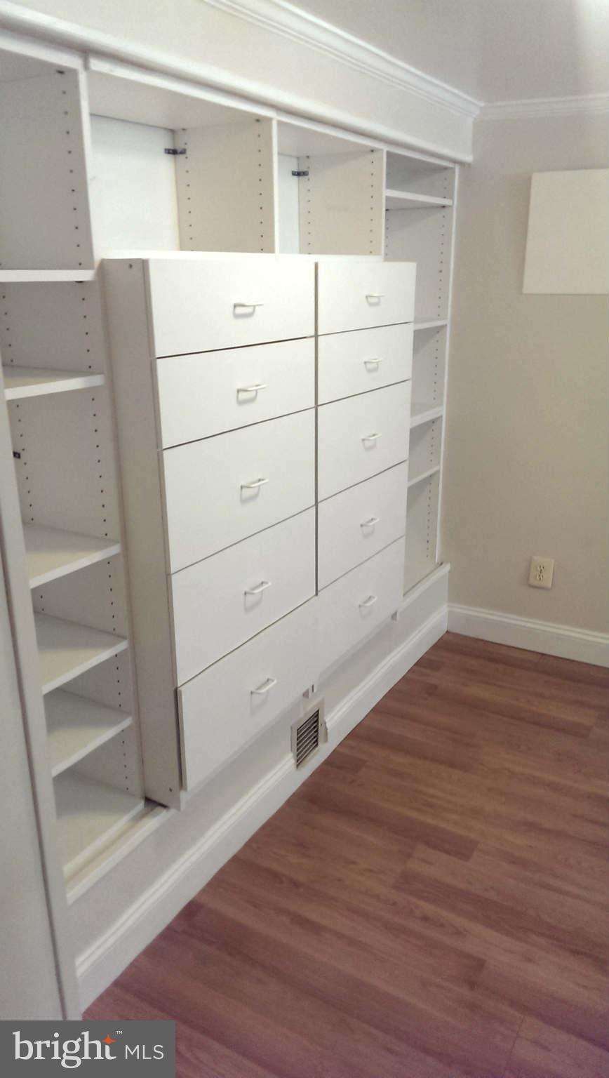 12102 Foley Street Silver Spring, MD 20902 - Photo 22 of 29 a view of a dresser