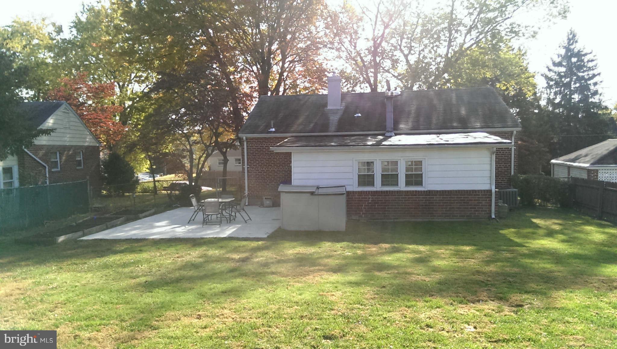 12102 Foley Street Silver Spring, MD 20902 - Photo 28 of 29 a view of a house with pool yard and sitting area