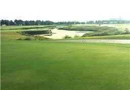 a view of a lake with a big yard