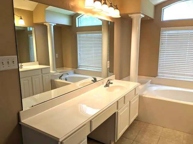 a bathroom with a sink and a bathtub