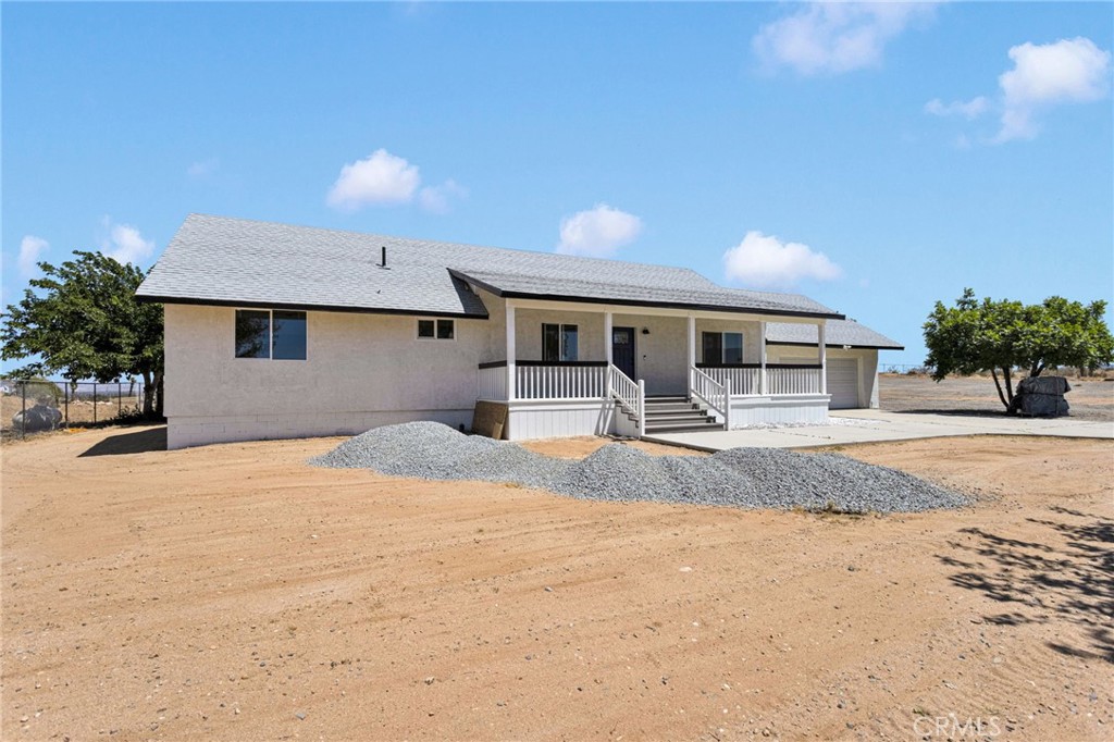 8038 Begonia Road Phelan, CA 92371 - Photo 3 of 49 a house with a outdoor space