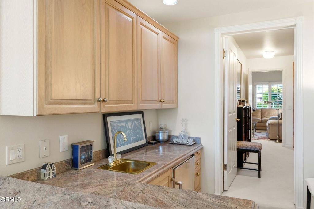 2317 Canyonback Road Los Angeles, CA 90049 - Photo 24 of 72 a kitchen with stainless steel appliances granite countertop a refrigerator and a sink