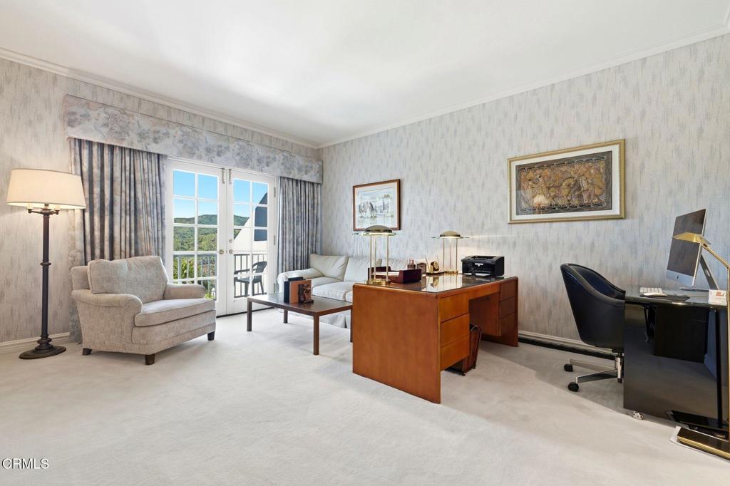 2317 Canyonback Road Los Angeles, CA 90049 - Photo 37 of 72 a living room with furniture and a window