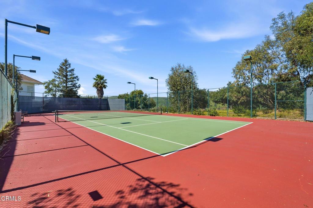 2317 Canyonback Road Los Angeles, CA 90049 - Photo 56 of 72 a view of a tennis court