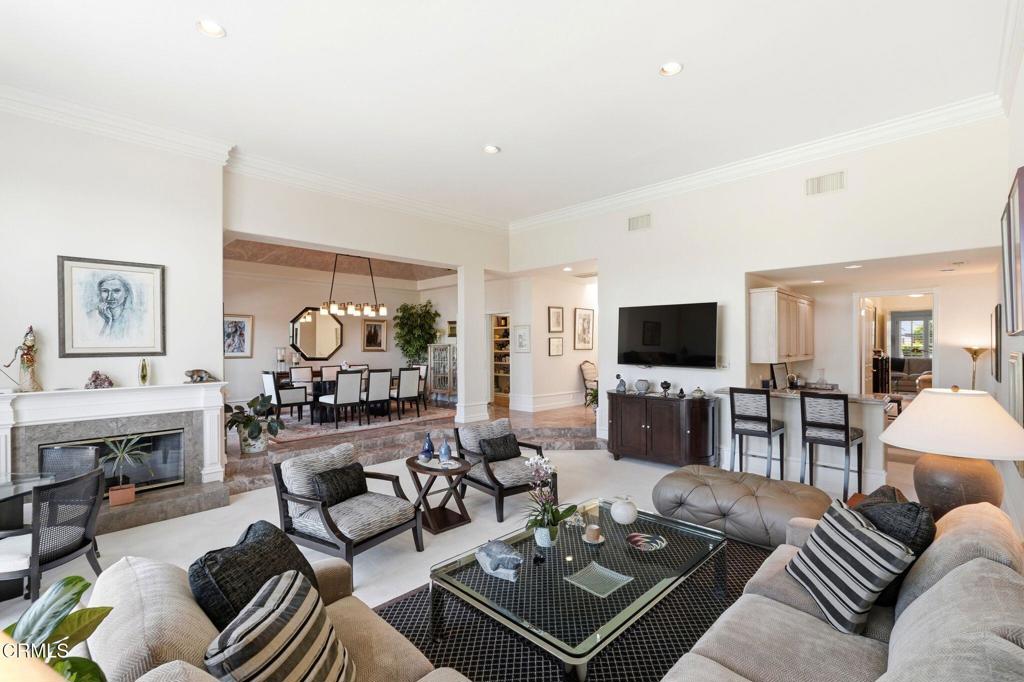 2317 Canyonback Road Los Angeles, CA 90049 - Photo 6 of 72 a living room with furniture and a flat screen tv